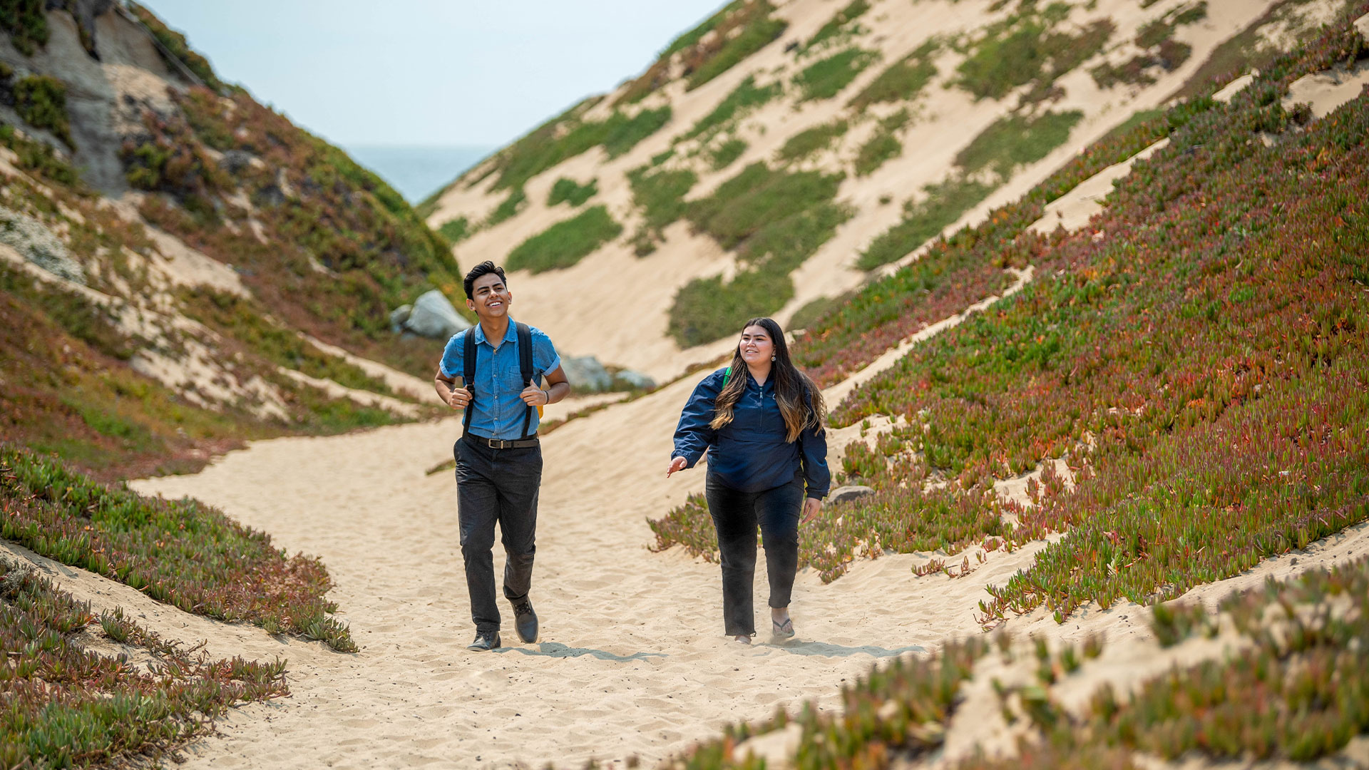 Photo: Students strolling through the Fort Ord dunes by the beach
