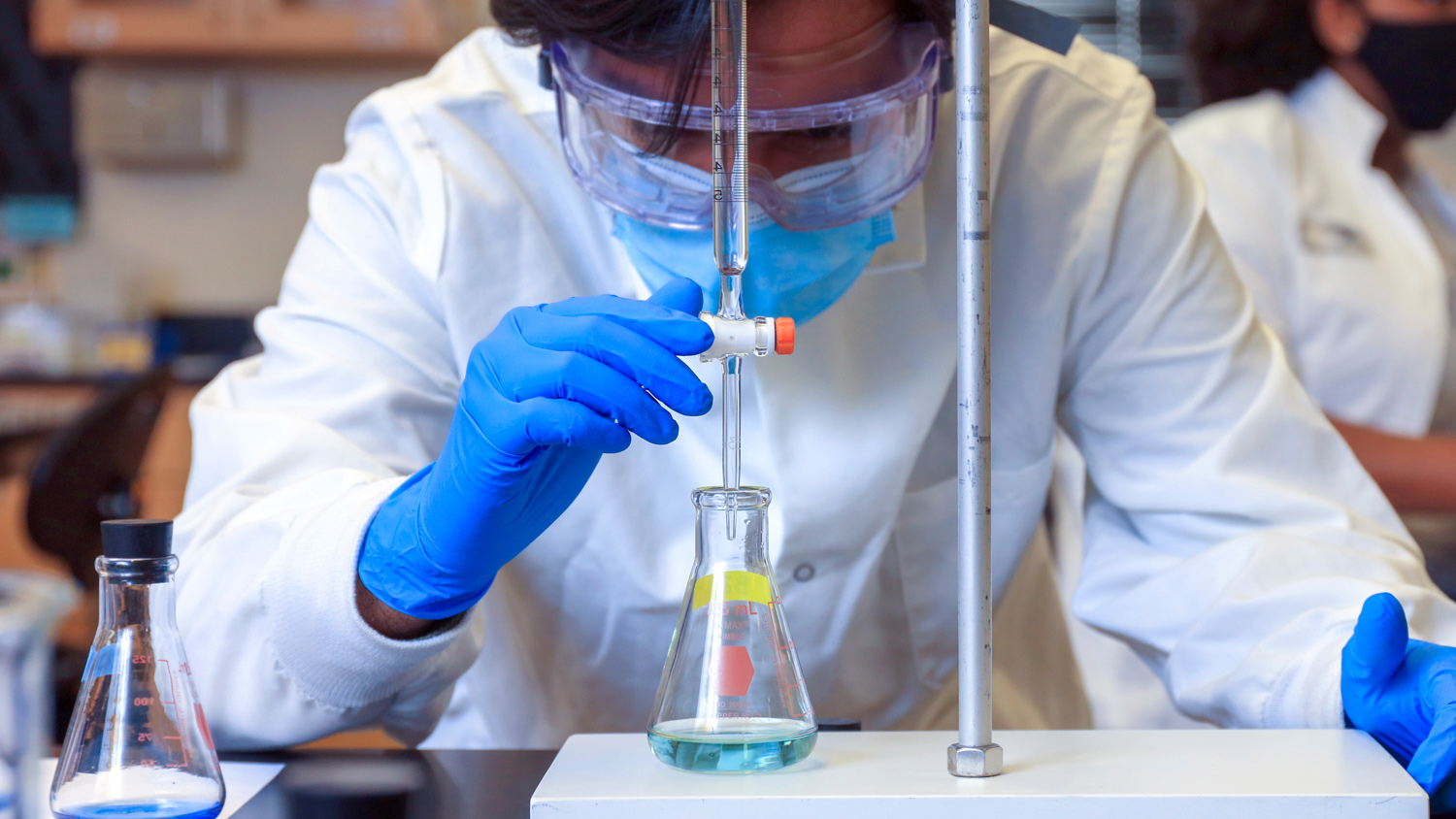 A student conducting a chemistry experiment