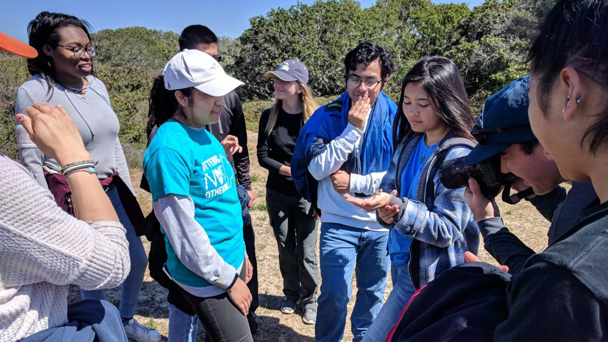 A group of student club members outdoor