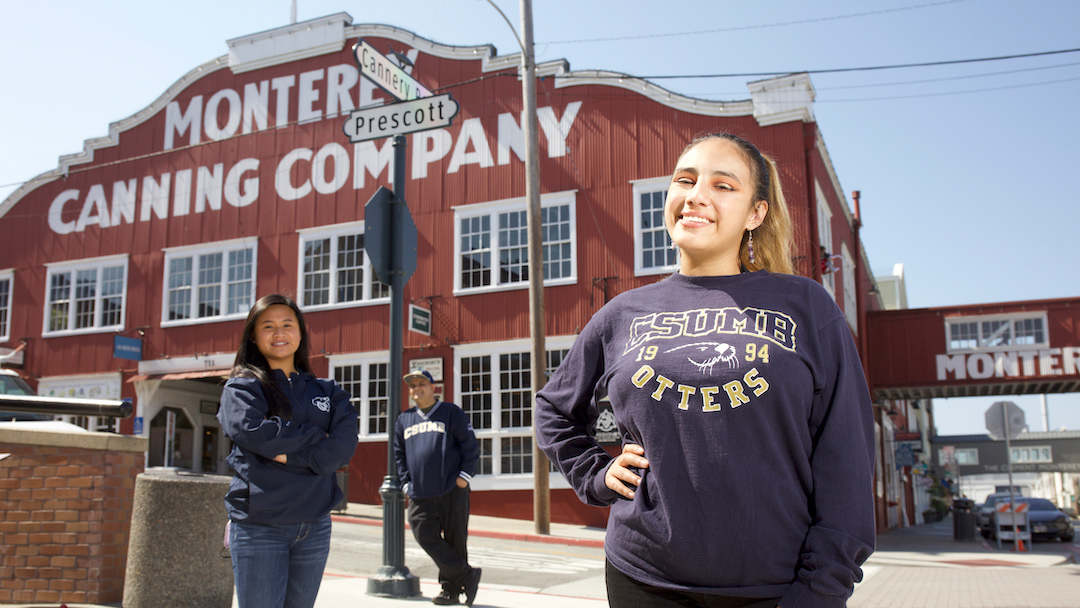 A photo of CSUMB students in front of the Monterey Canning Company