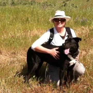 Dr. Arlene Haffa hiking with her dog