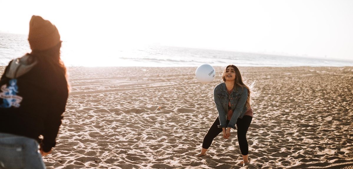 stock photo of people playing volleyball