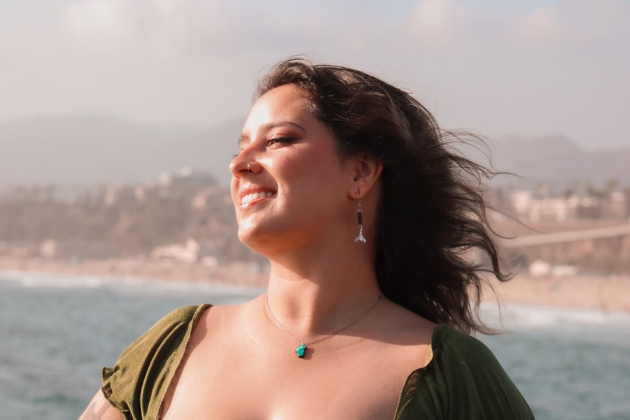 Emmy McColey wind in hair beach background
