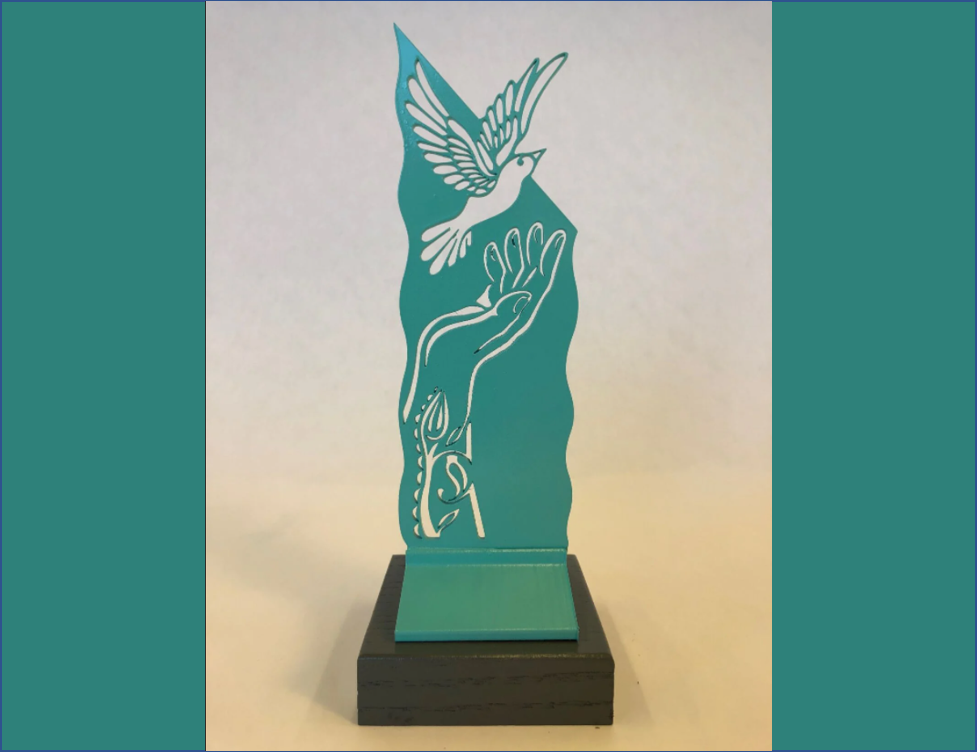 artist rendering of sculpture of hand releasing a dove sculpture