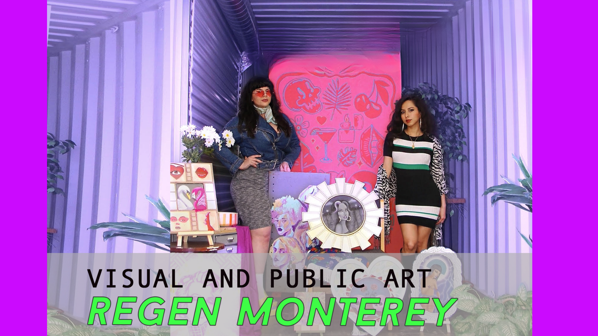 two women pose with art