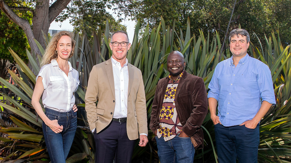 Interim Provost Andrew Lawson (second from left) with faculty members (from left) Lindsey Brammell, Jeremias Zunguze and Caetano Albuquerque. Jacqui Smith is not pictured. | Photo by Brent Dundore-Arias