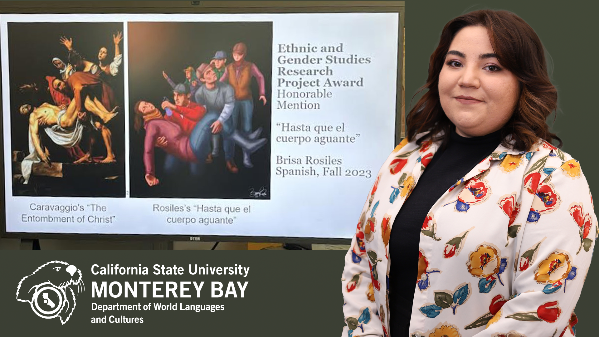 Student posing next to on screen presentation