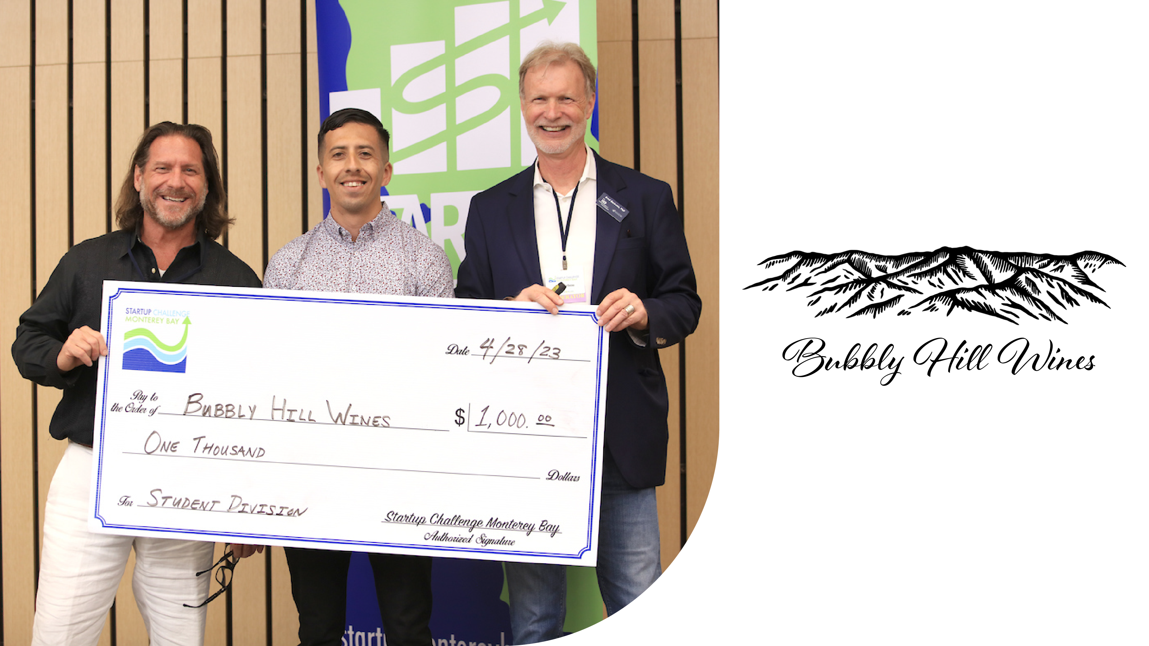 Student winner and Brad Barbeau holding large check