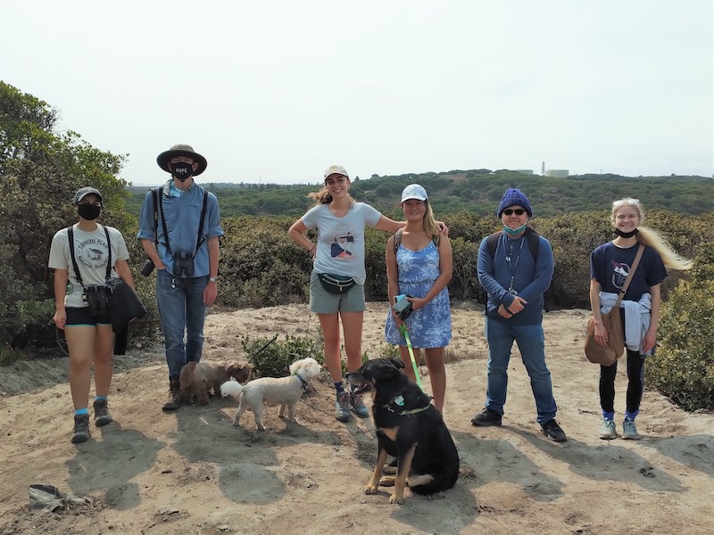 Dr. Jenny Duggan's students pose outdoors