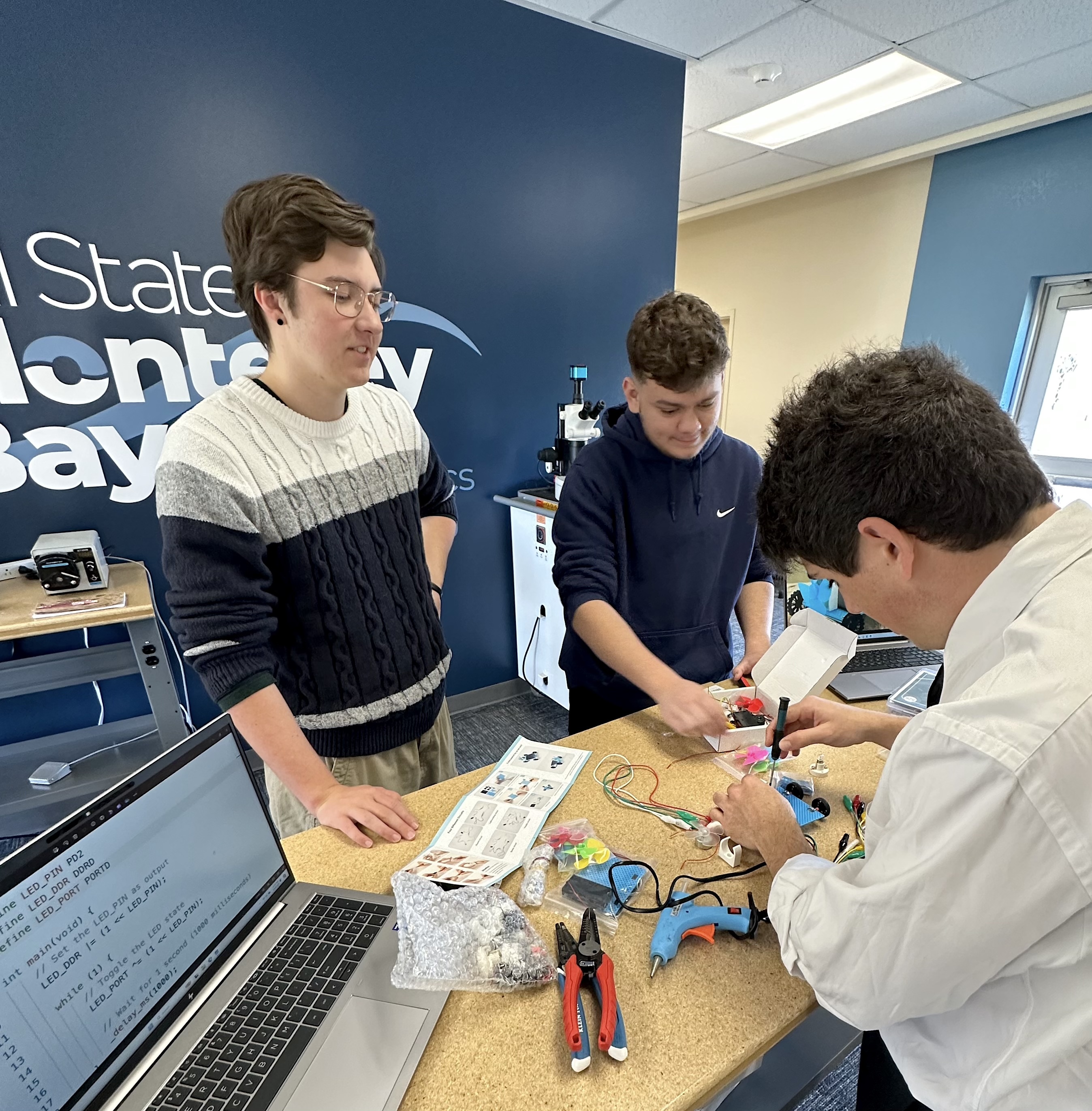 students developing solar car