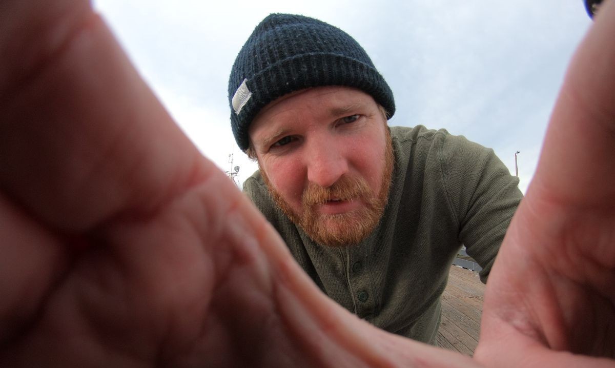 Image of Ryan Solymar holding camera