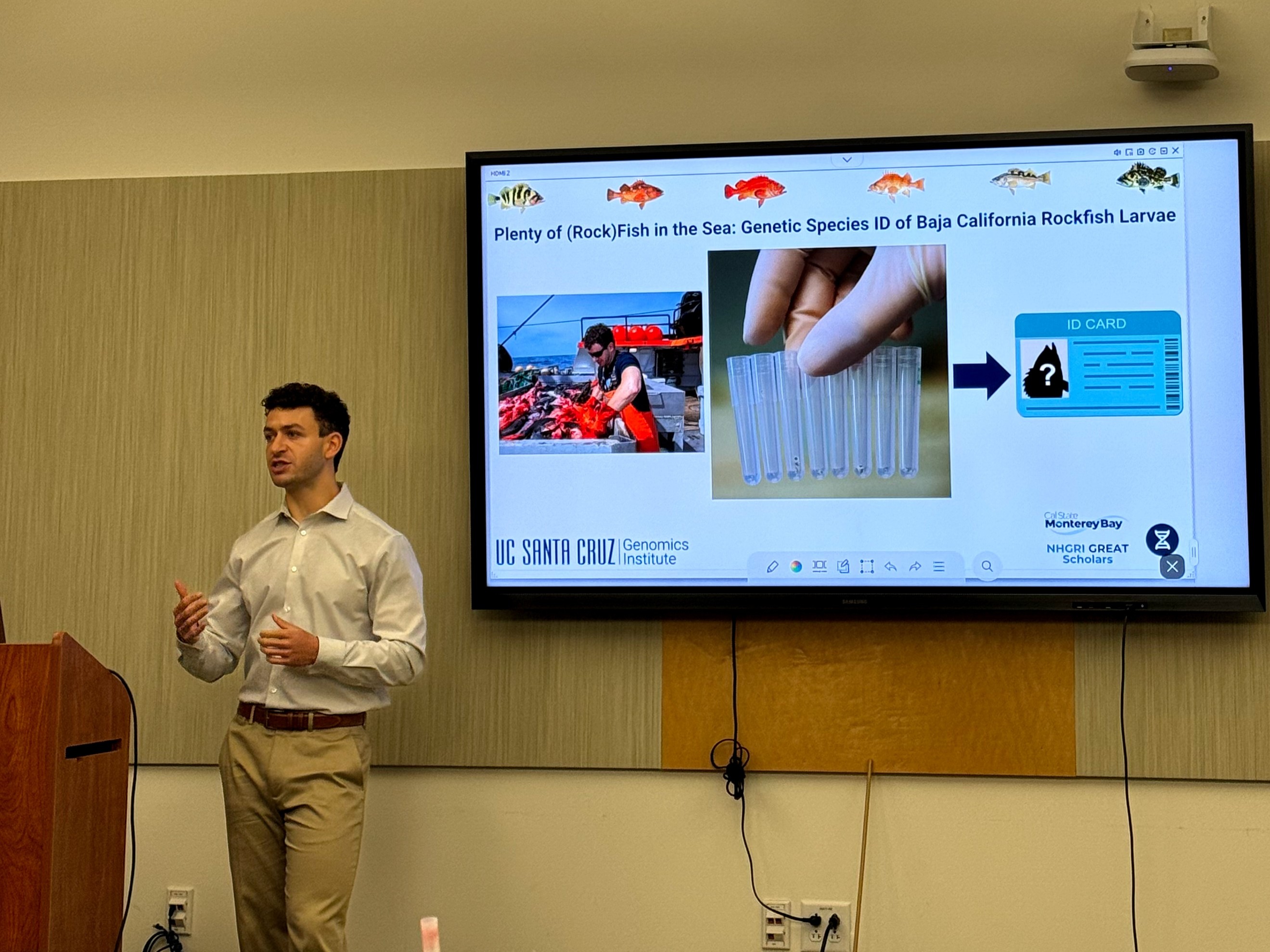 Max presenting a slide about genetic species ID of Baja California rockfish larvae.