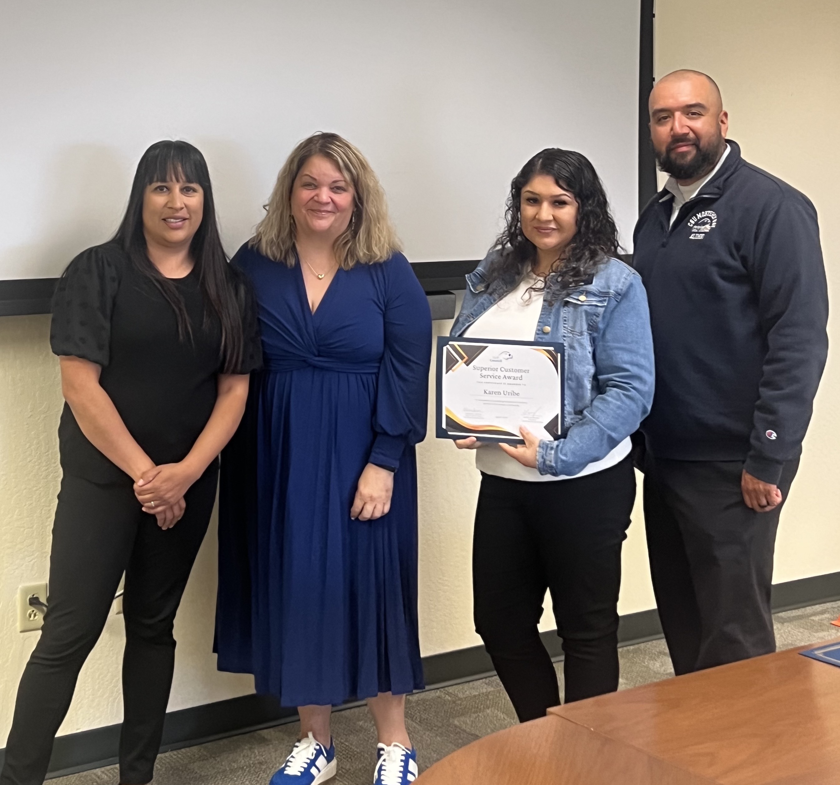 Karen Uribe accepting her award.