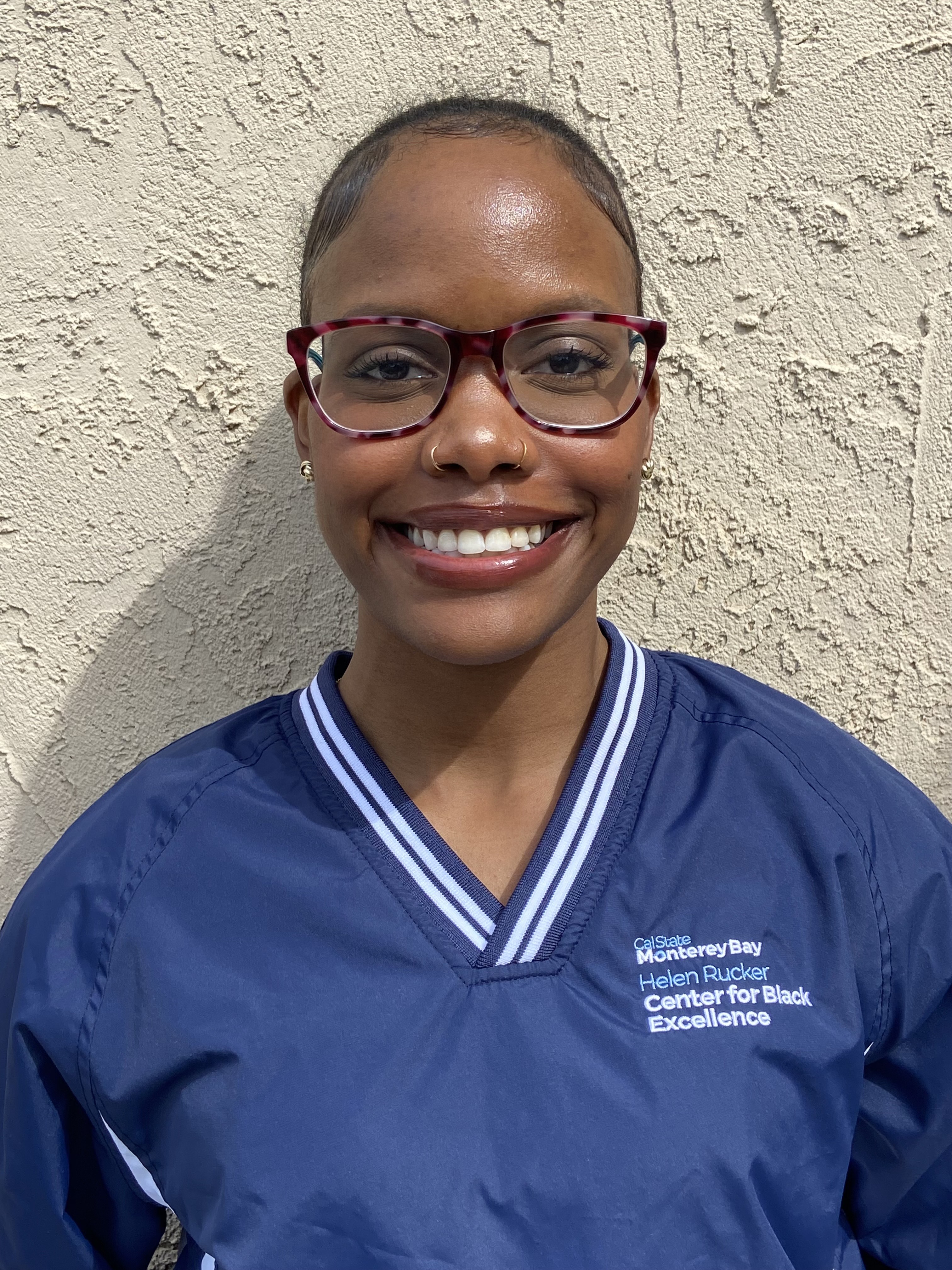Student Coordinator wearing navy blue windbreaker