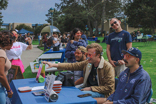 Group of students tabling for clubs at Otter Showcase
