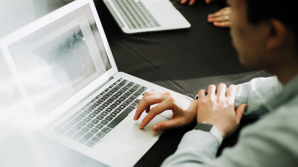Photo: A person using laptop