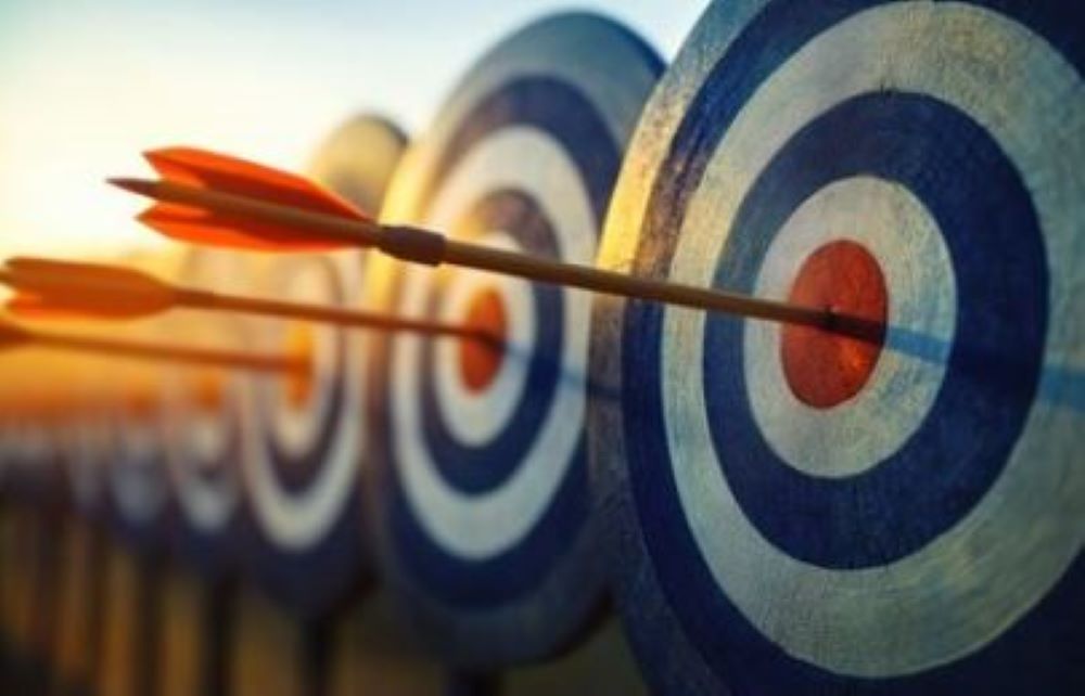 Bullseyes with arrows in them.