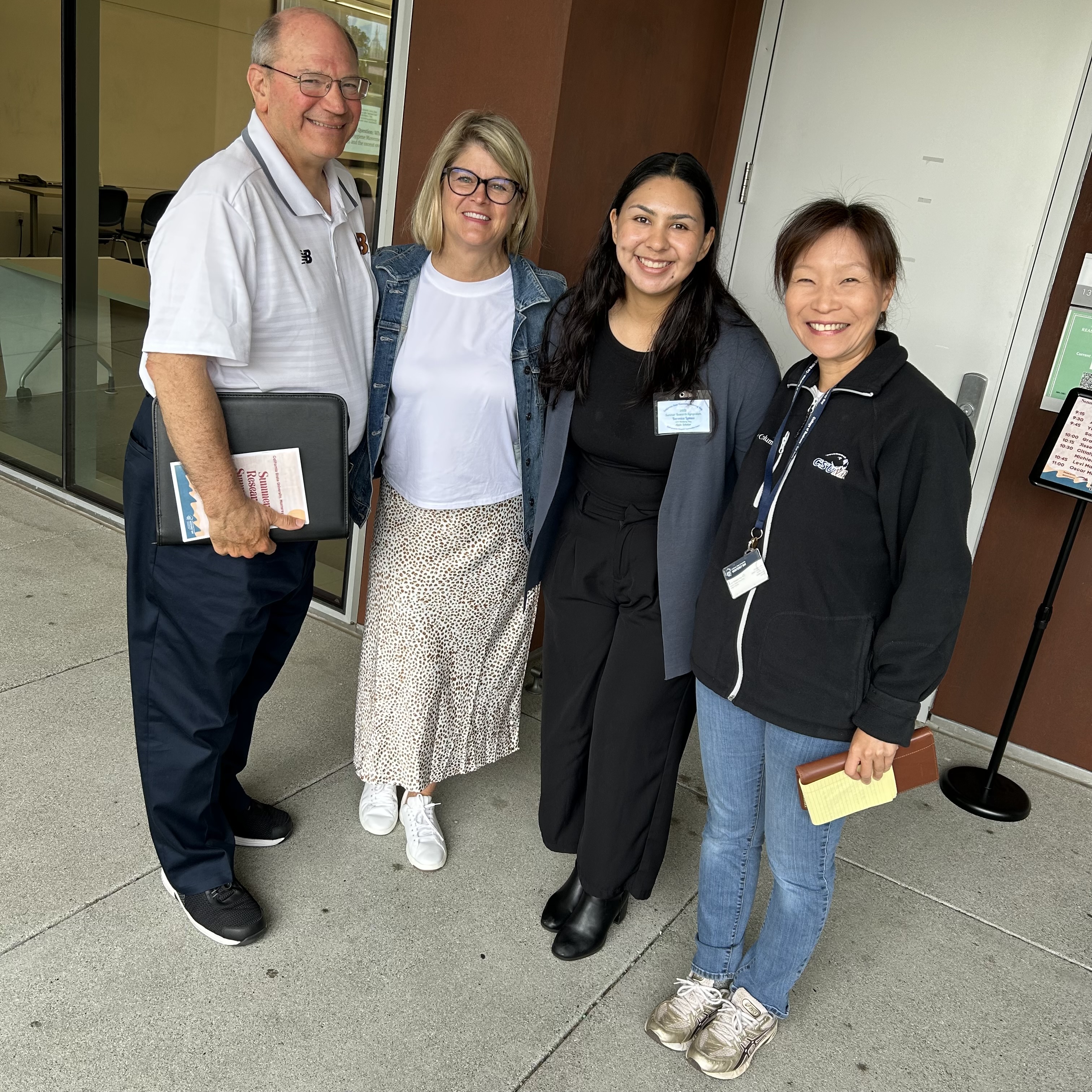 researcher with her mentors