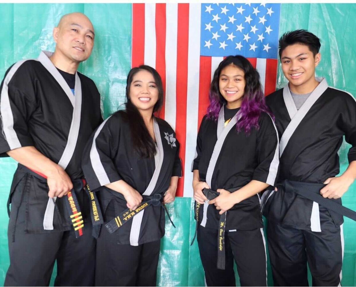 Four members of the martial arts Vanderlipe family, whose Salinas business was helped by CSUMB students