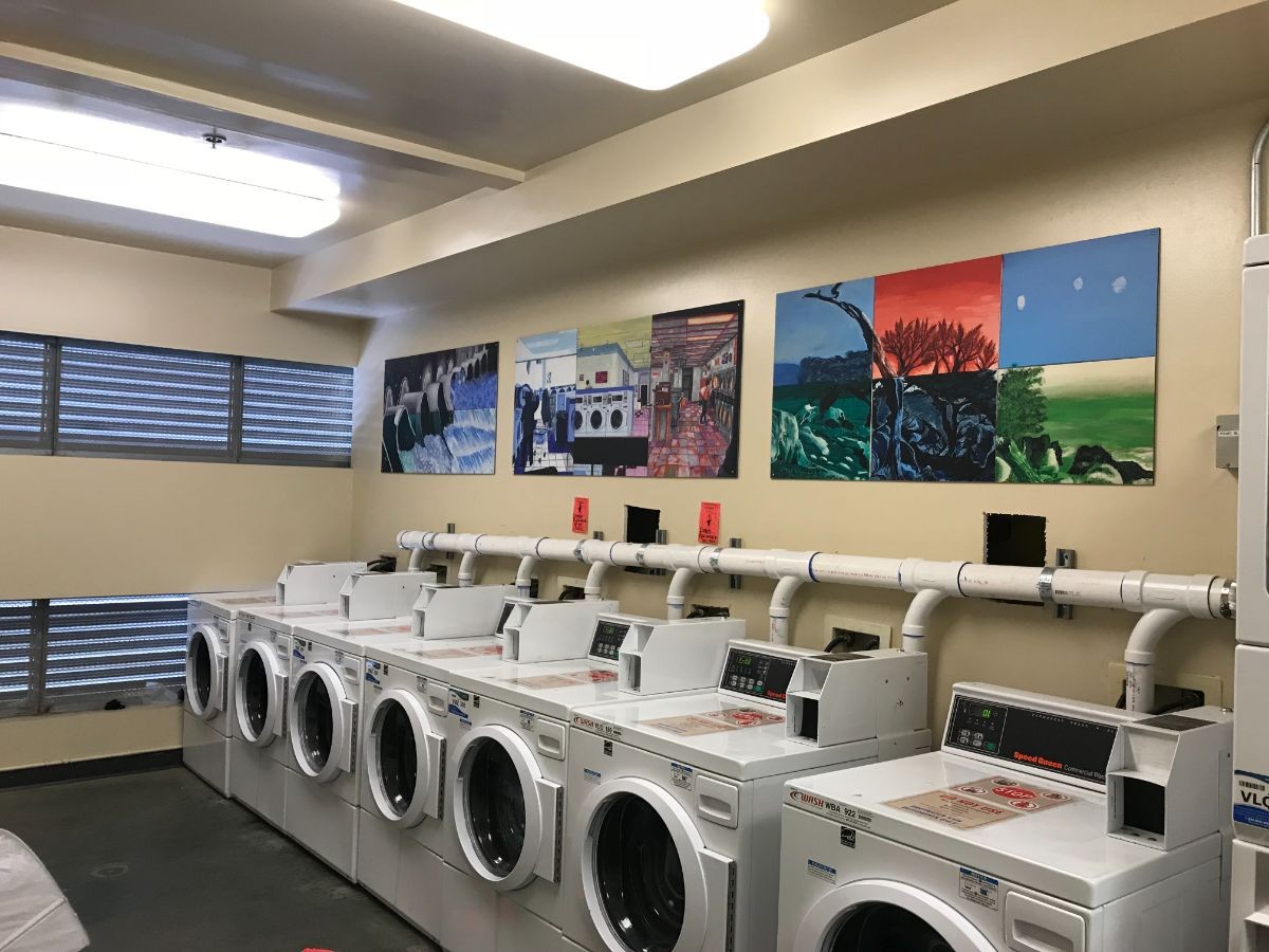 Washing machines at Pinnacles building outfitted with gray water diversion pipes