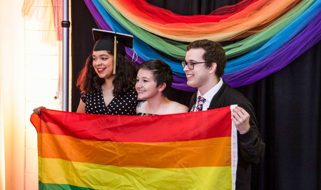 Students pose for a photo at the CSUMB Rainbow Graduation Celebration in 2019.