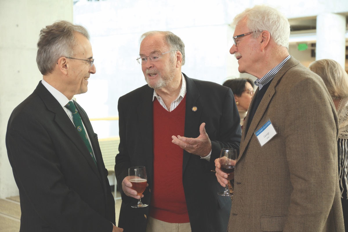 Sam Farr (center) talks with CSUMB President Eduardo M. Ochoa.