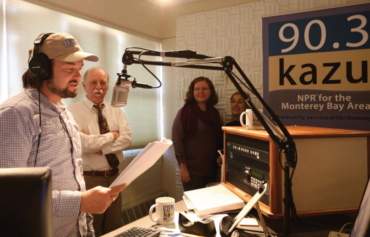 Morning Edition host Dylan Music on the air in the broadcast booth.