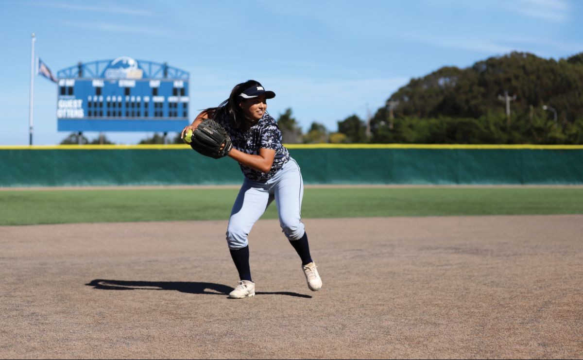 Softball player Vanessa Jacquez in action on the field.