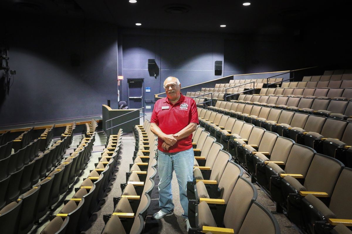 Phil Esparza standing in the World Theater
