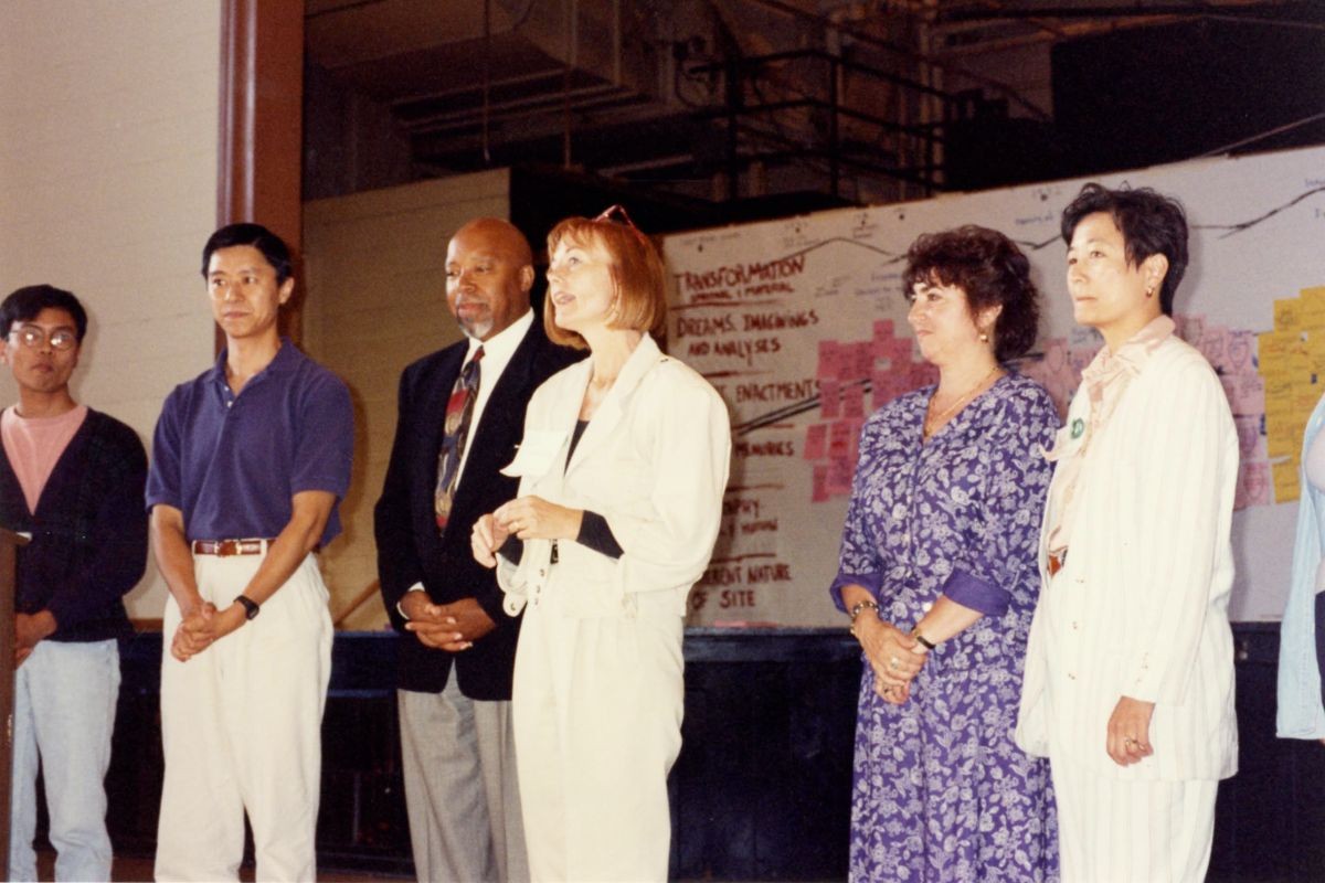 Humanities & Communication professor Cecilia O'Leary on stage (center) with other faculty members including Qun Wang, Richard Bains and Rina Benmayor in 1995.