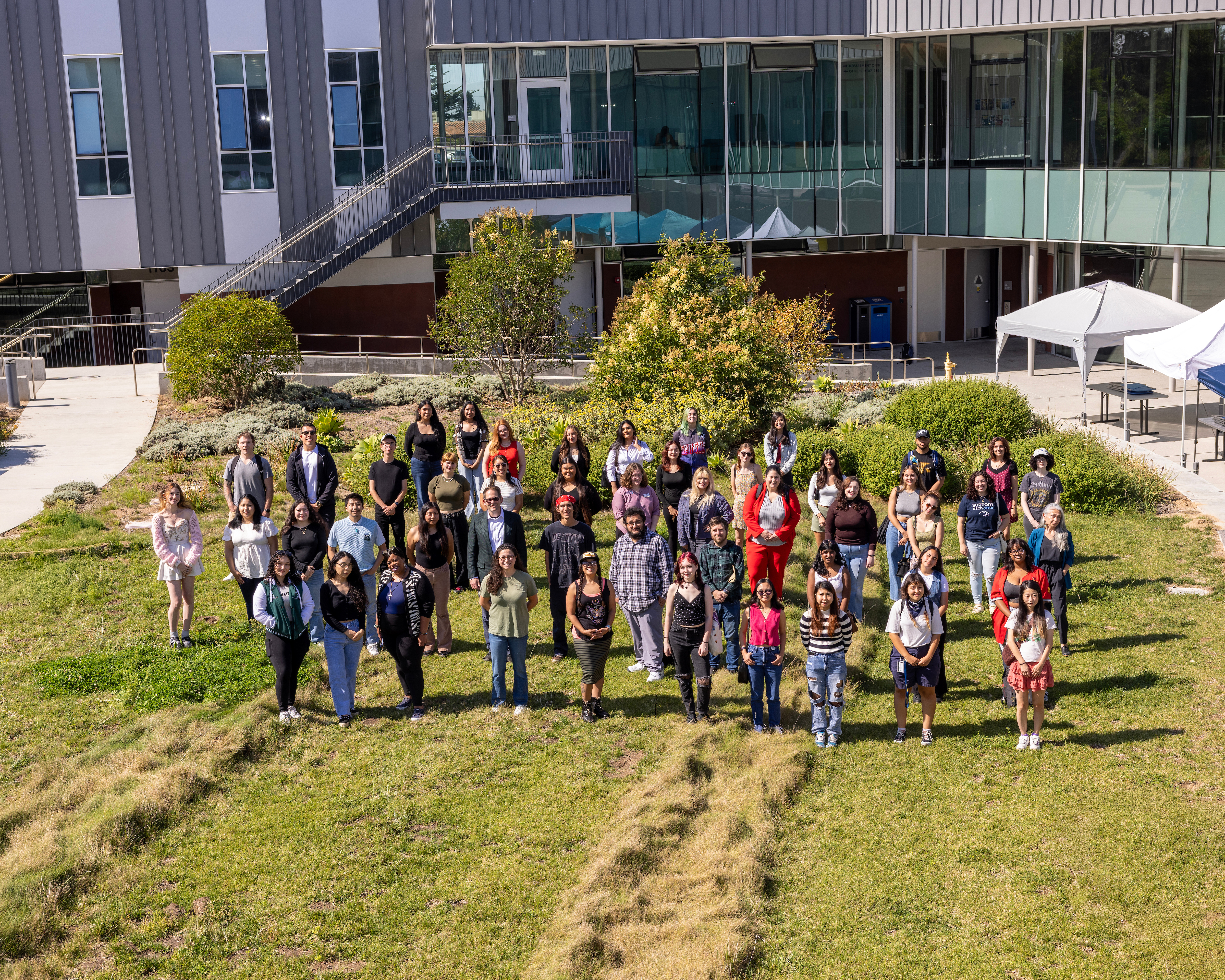 students on the 2024 Spring Dean's List stand outside