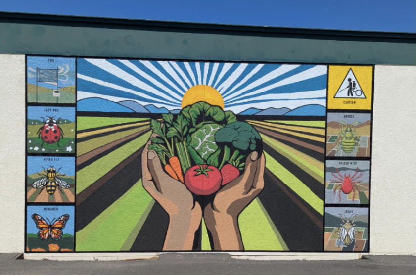 mural of hands holding produce from salinas