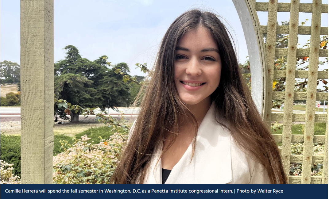 Camille Herrera smiles with csumb campus in background