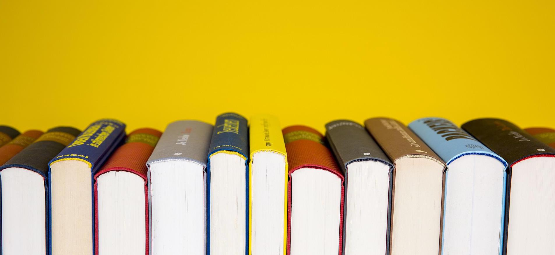 books on a yellow bg