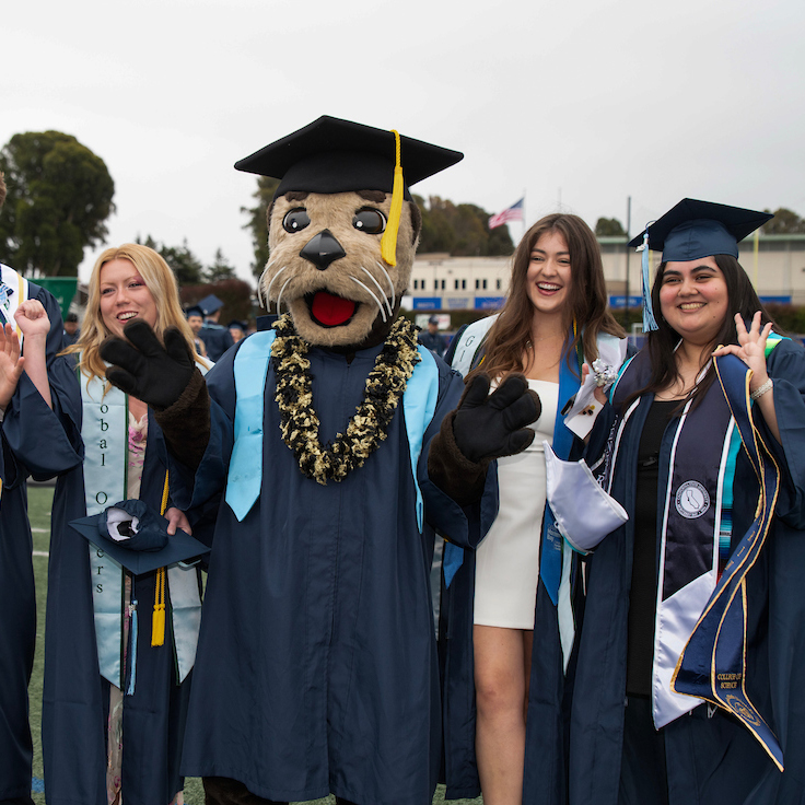 Global Otters Graduates with Monty