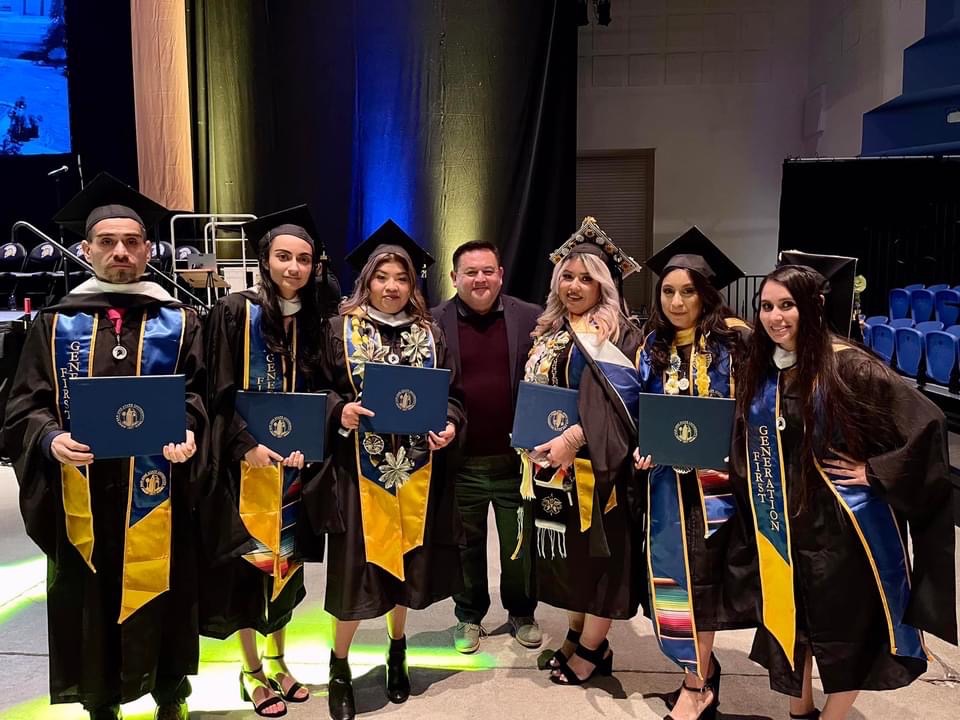 2021 SJSU MA in Spanish awarded to 6 former WLC SLHC majors shown holding diplomas at commencement ceremony