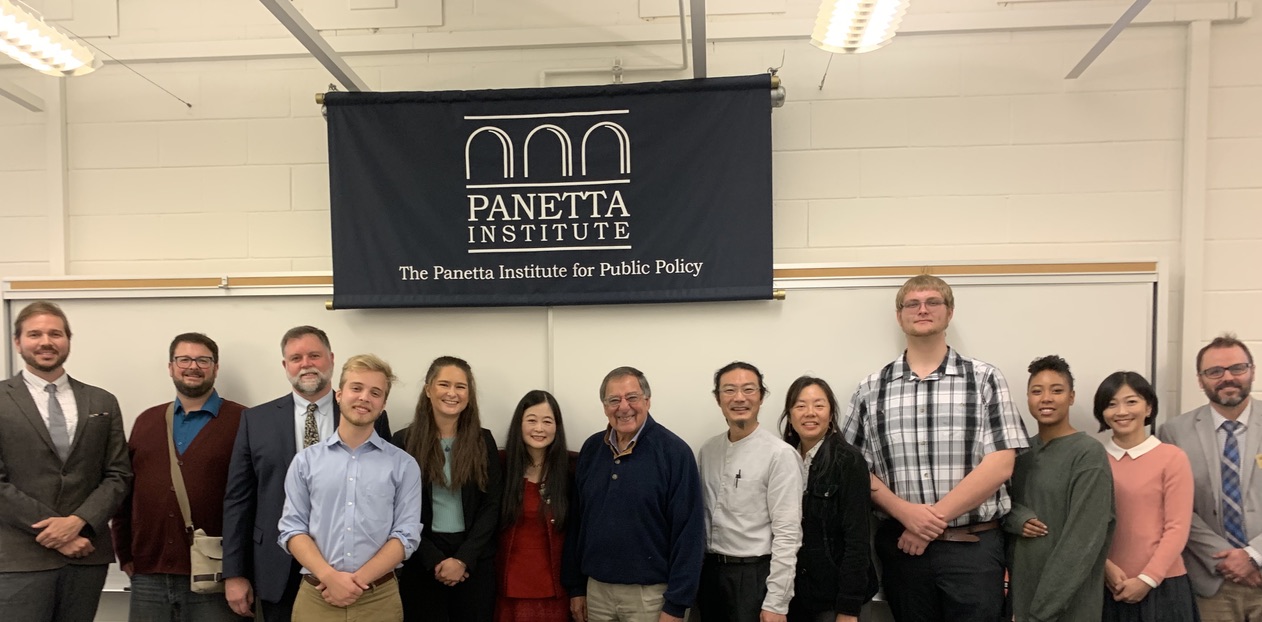 Students and Leon Panetta meeting in classroom