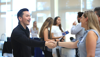 People greeting each other at Accounting Networking Event