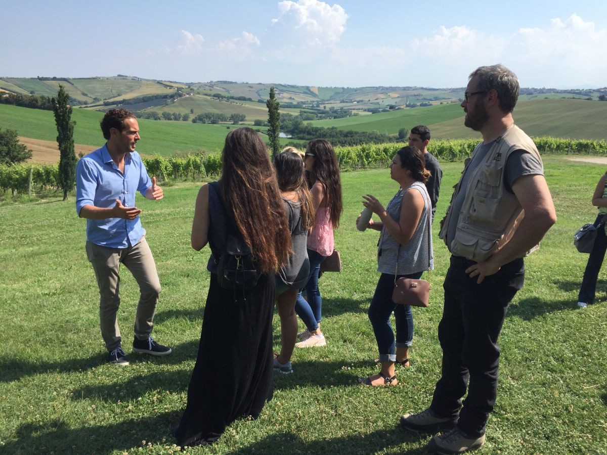Alberto Guerrieri shows his family vineyards to CSUMB students.