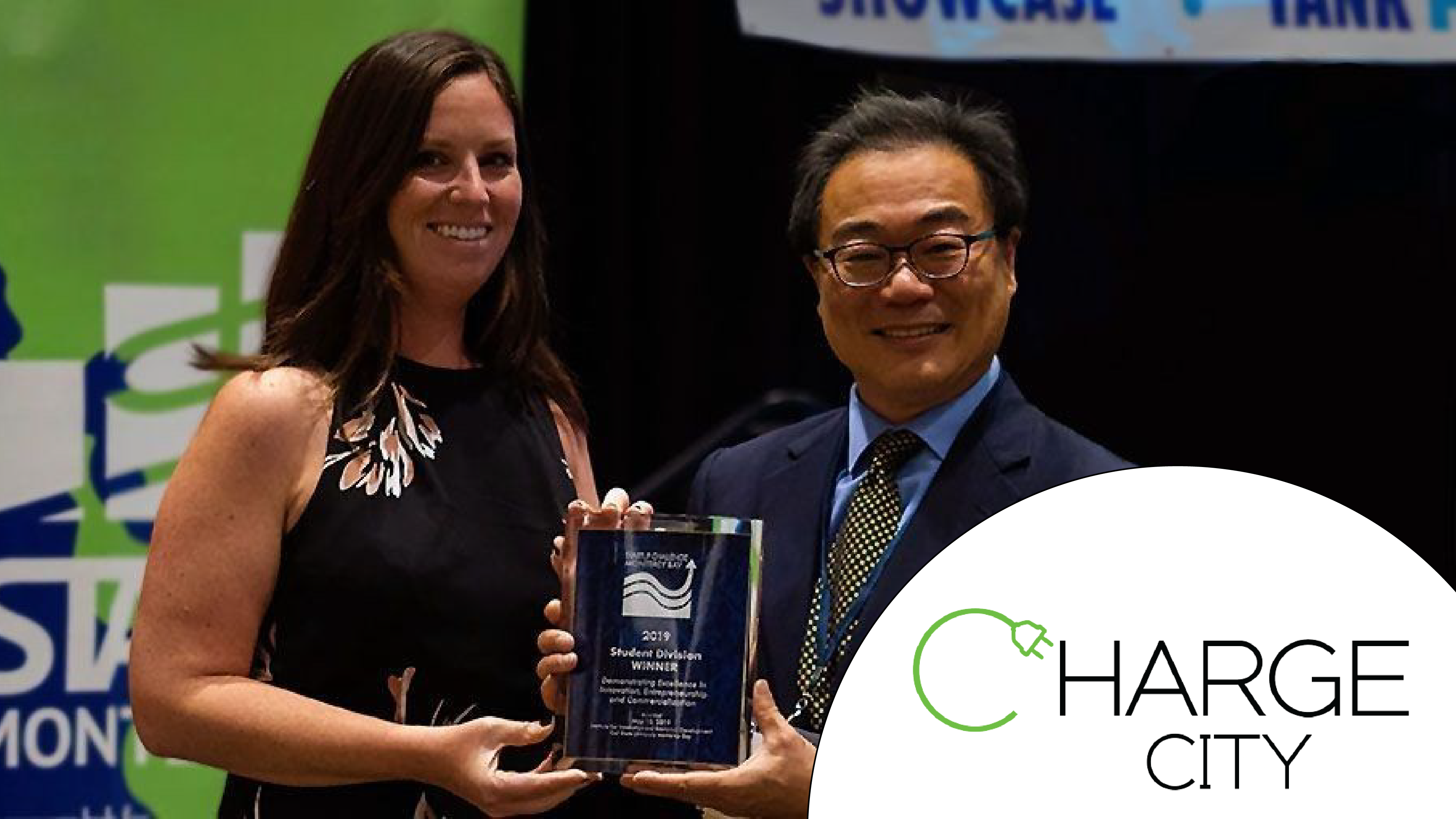 2019 Startup Challenge Student Division Winner - Charge City - Erin Lannon and Eric Tao holding trophy