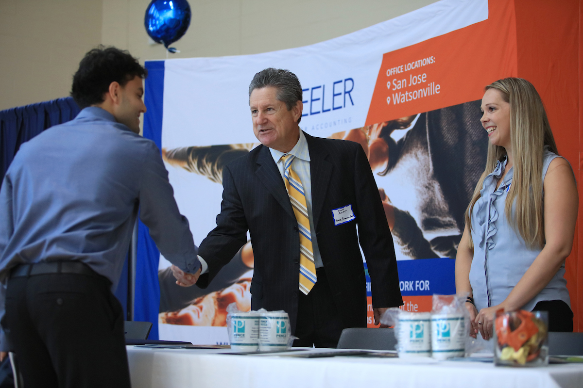 Employer greeting student at Accounting Networking Event 2022