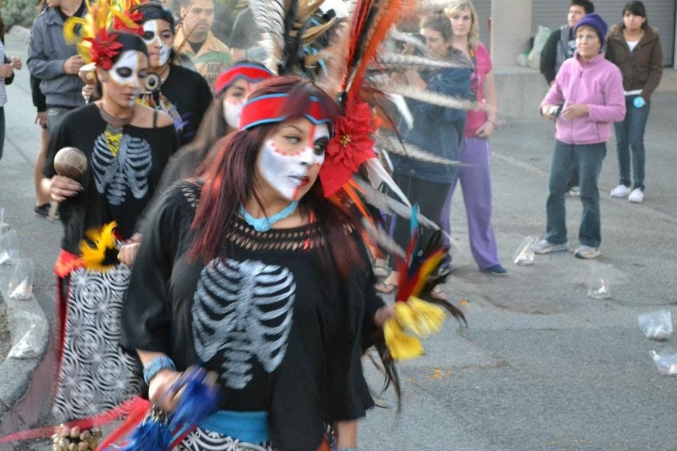 Aztec dancers lead the procession