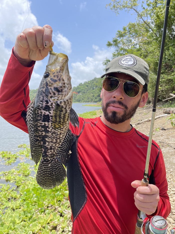 Rafael Perez holding a fish