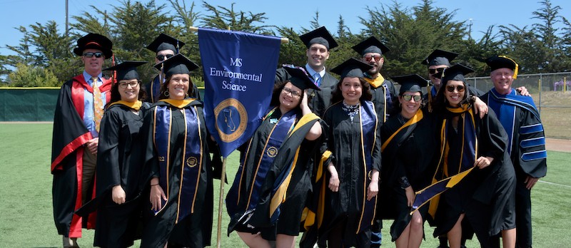 ENSCI Graduates Pose in Regalia at Spring 2022 Graduation Ceremony