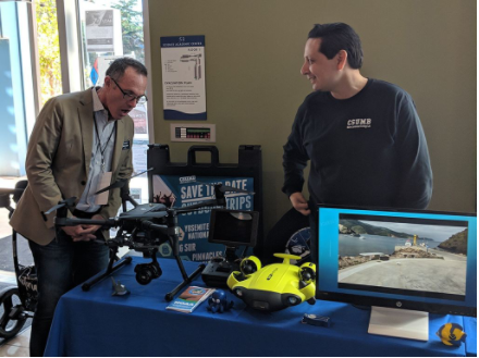 marine science events table with drone equipment