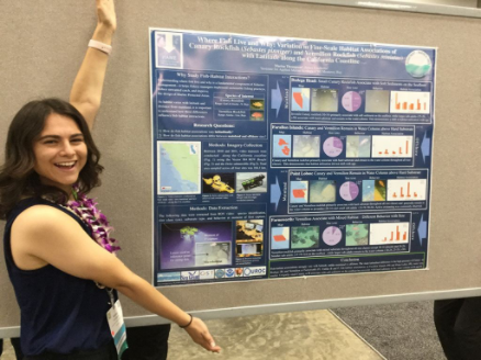 marine science student at a conference poster presentation