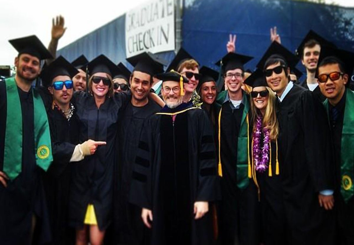 Professor Doug Smith and students at graduation