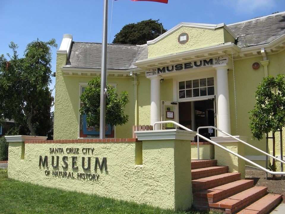 The front of the yellow building housing the Santa Cruz Museum of Natural History