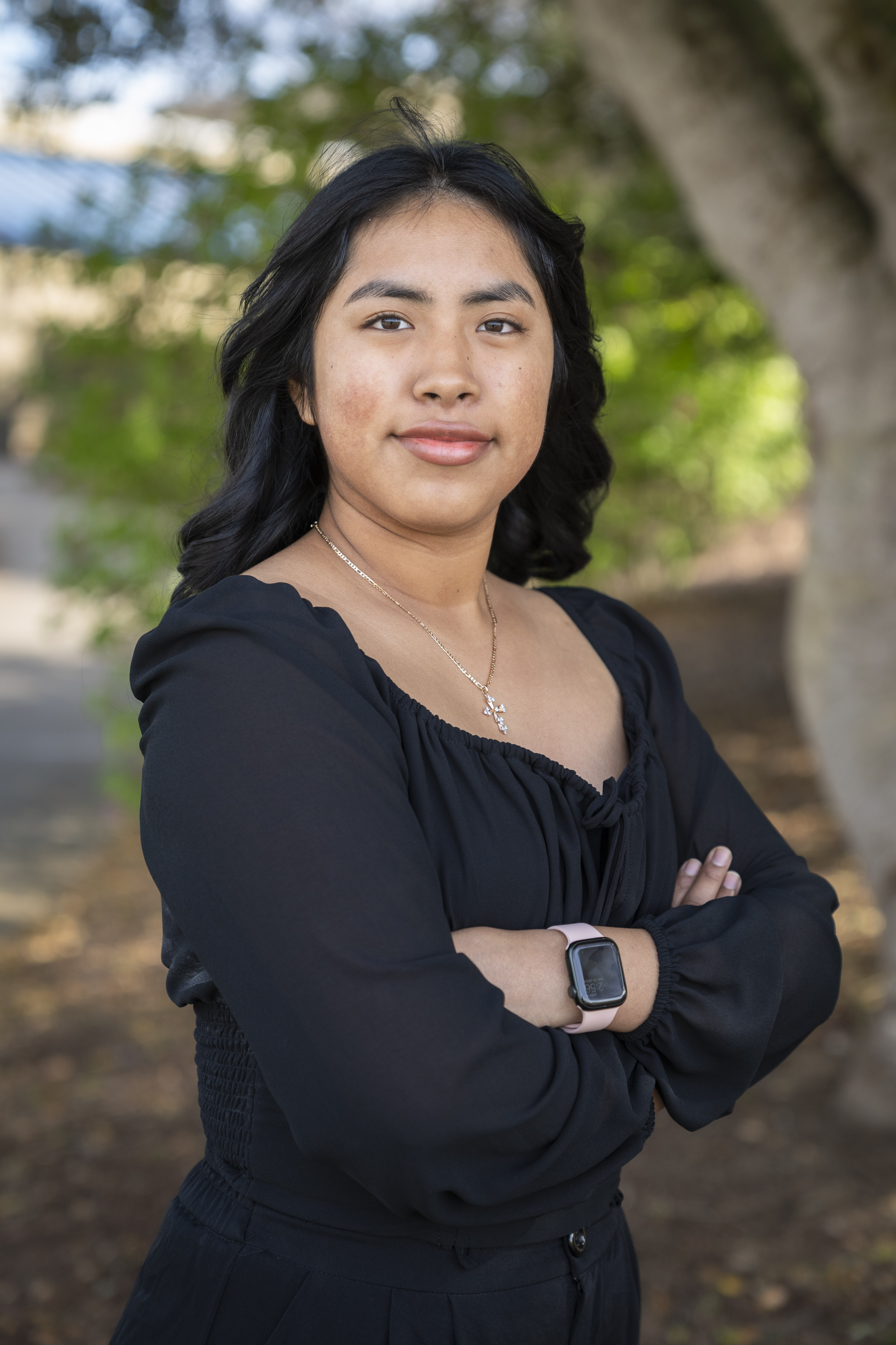 Student staff image of her folding her arms