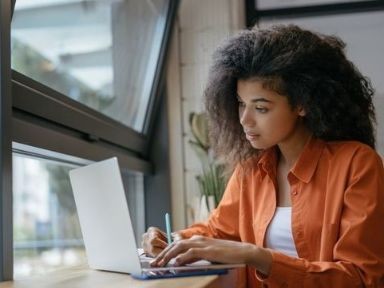 student working at a computer